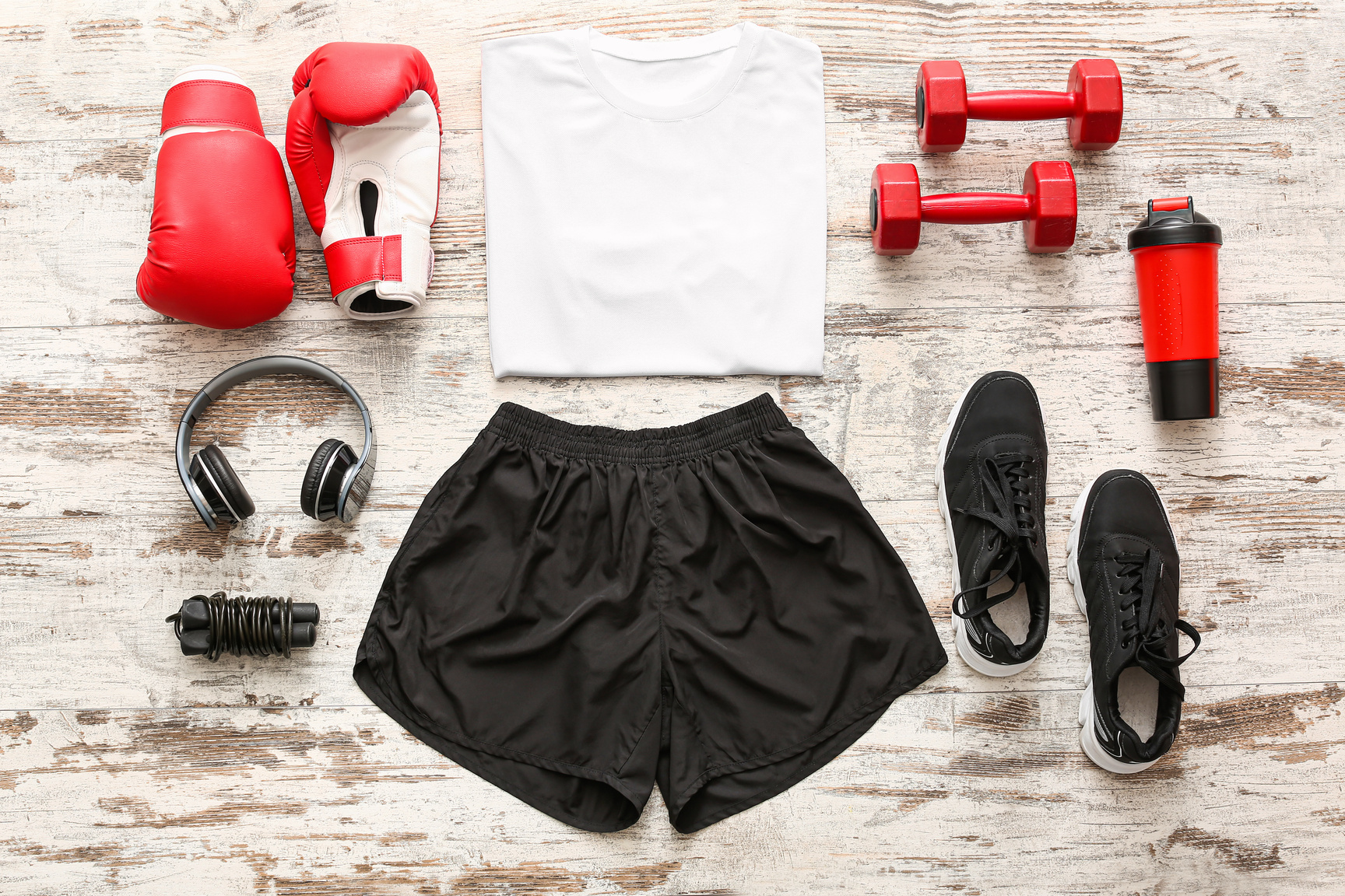 Flatlay of Men's Sportswear and Workout Equipment